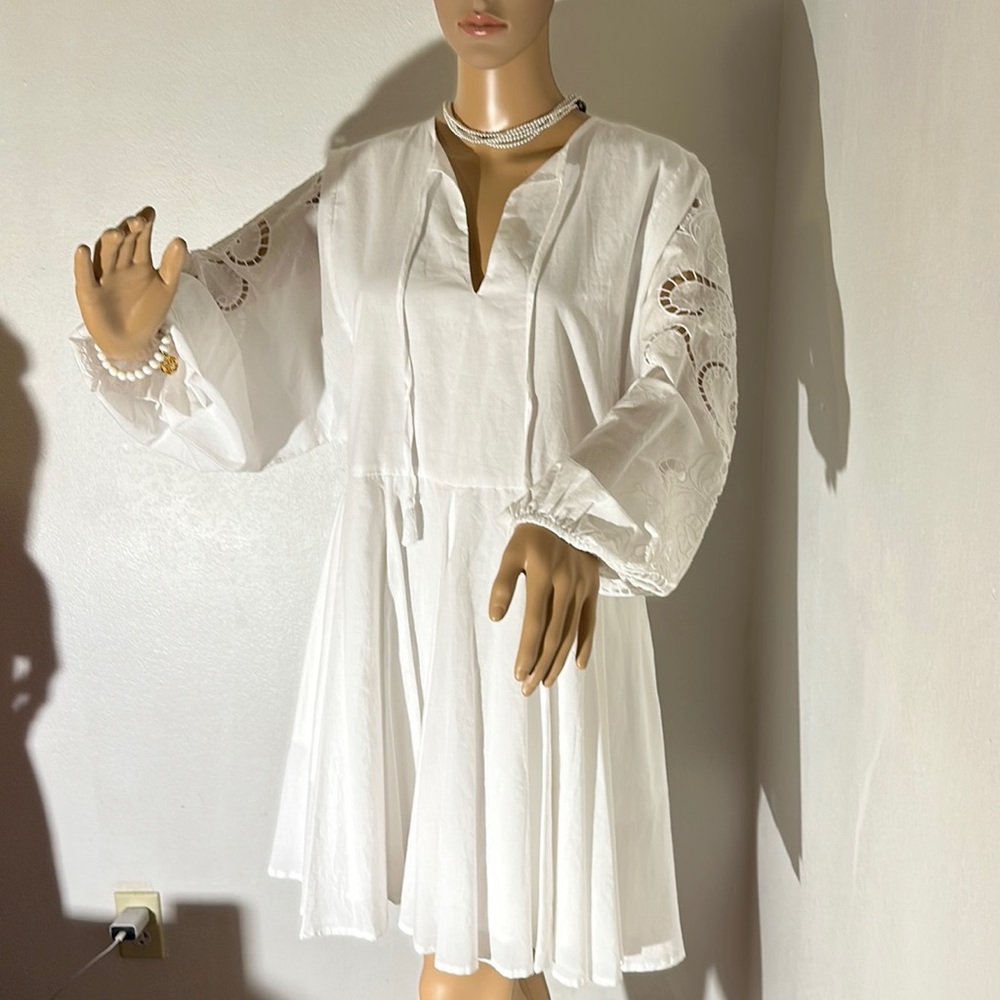 this is a long sleeves embroidered summer dress